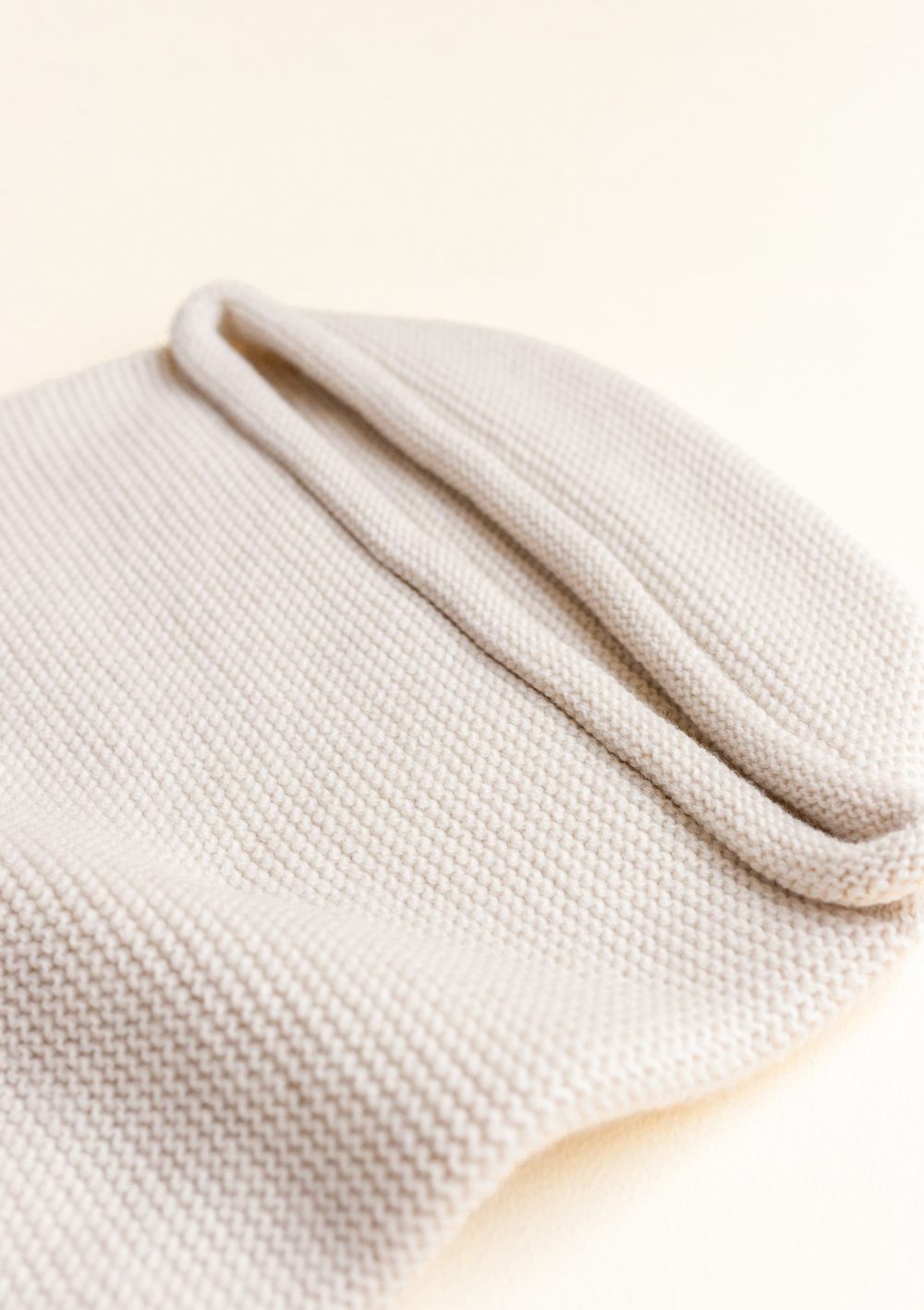 Hvid Strick-Pucksack Cocoon Cream