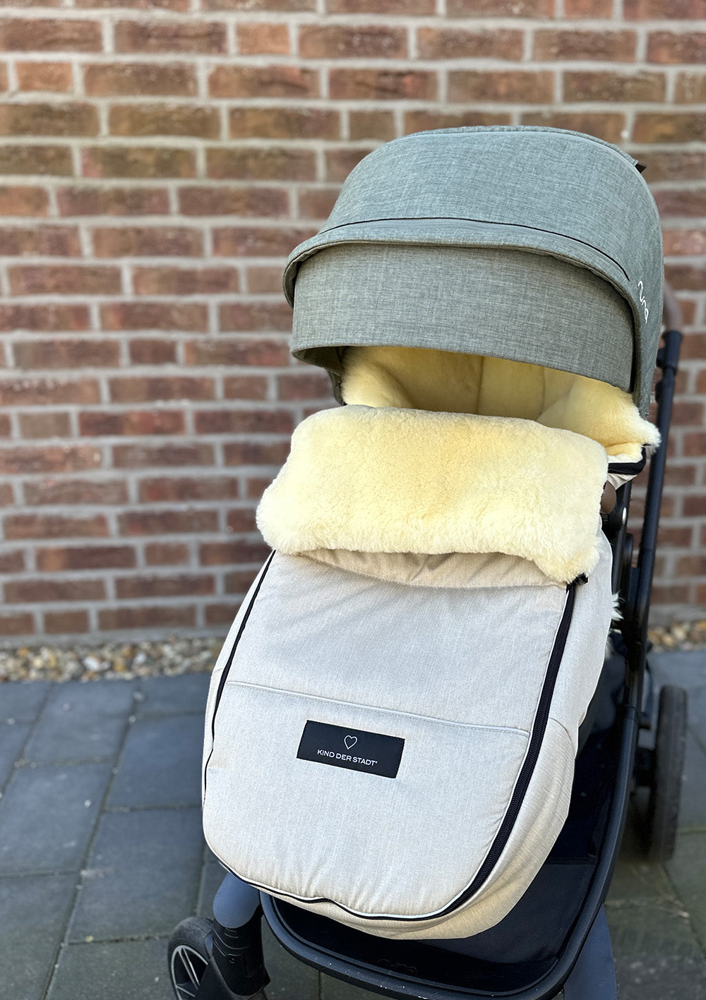 Premium Lammfell-Fußsack Limited Edition dune beige